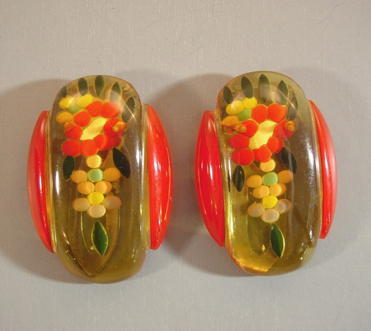 BAKELITE apple juice, red reverse carved clips, set of 2