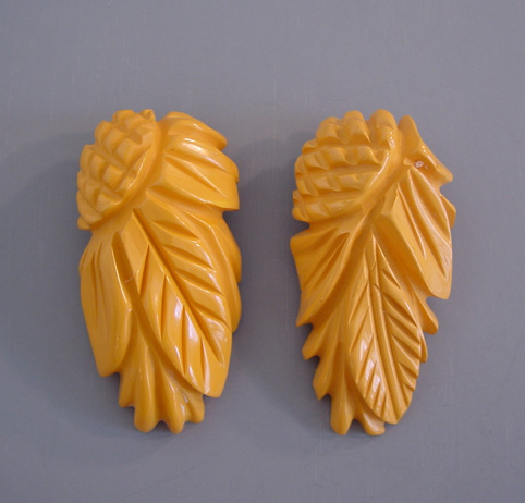 BAKELITE carved pineapple carved sunflower dress clips - Morning Glory  Jewelry & Antiques