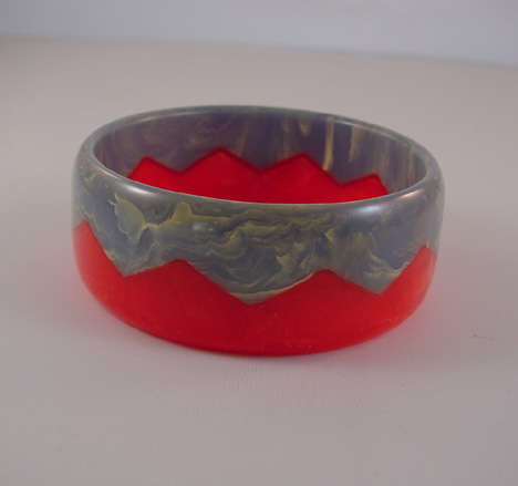 DOMBEK bakelite red and medium blue swirl zigzag bangle