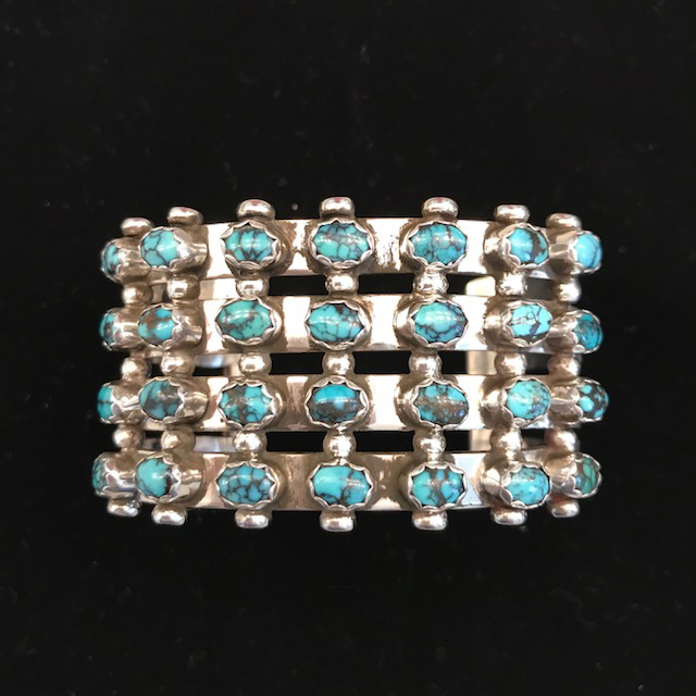 TURQUOISE bracelet in sterling in a larger size with four rows of turquiose