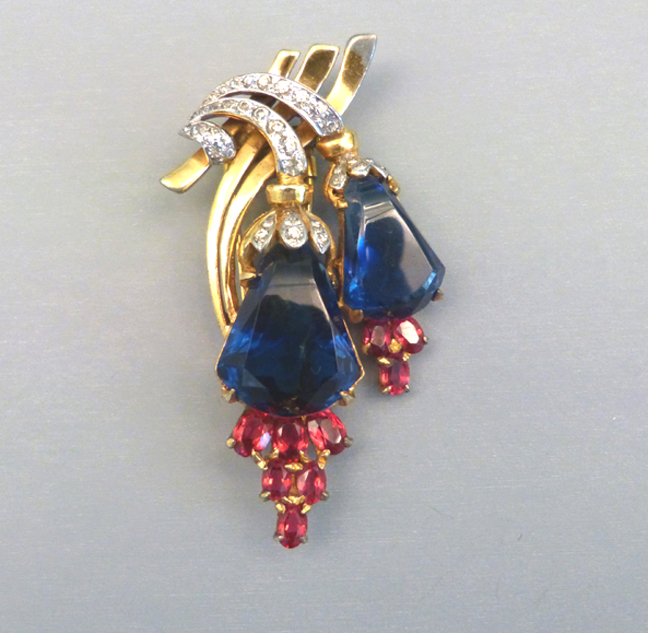 DEROSA fur clip with big blue bell-shaped unfoiled rhinestones, c 1940