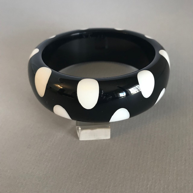 SHULTZ bakelite black bangle white dots alternating on each edge