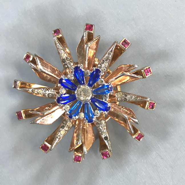 DEROSA starburst fur clip with blue, red and clear rhinestones, three tiered setting