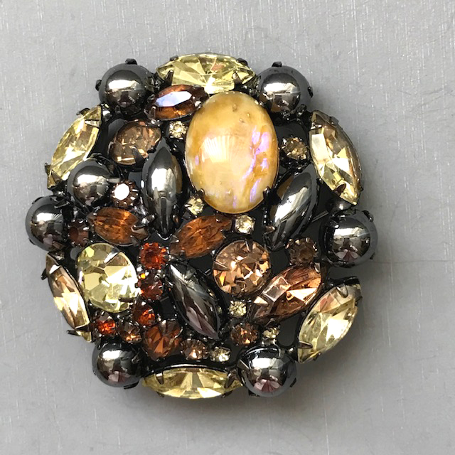 Juliana Brooch with An Opalescent Glass Oval Cabochon, Dark Gray Rhinestones That Are The Color of Hematite, Yellow and Caramel Colored Rhinestones
