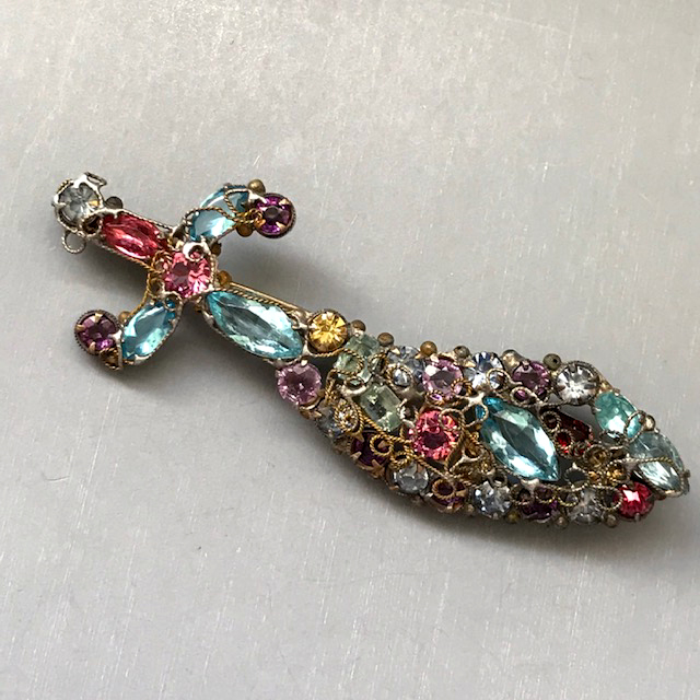 ROBERT saber or sword pin with aqua, pink, pale yellow, purple and blue rhinestones