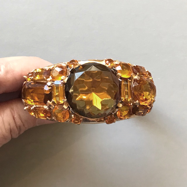 DEROSA bracelet with unfoiled topaz gold, brown and caramel colored rhinestones