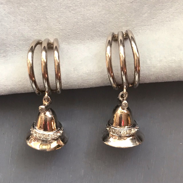 DEROSA bell earrings with a clear rhinestone band around each bell and a glass pearl clapper set in gold plated sterling silver