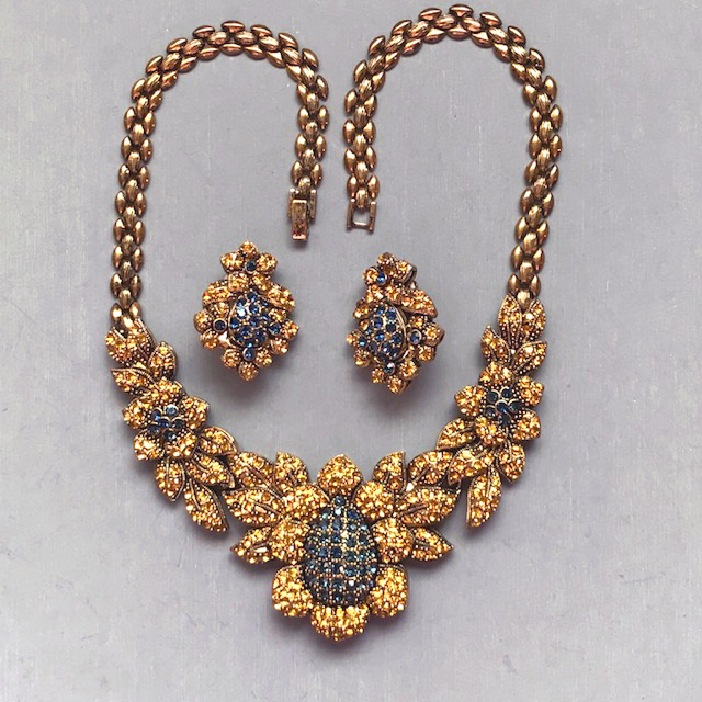 SUNFLOWERS necklace and earrings in a gold tone setting with lush yellow and blue rhinestones, an unusual set