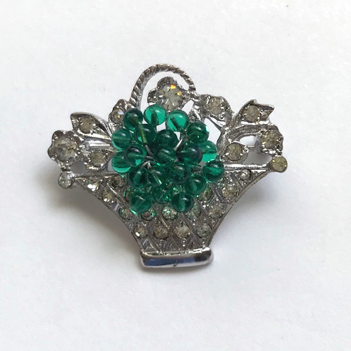 DEROSA dainty basket pin with green glass beads and clear rhinestones in a sterling silver setting