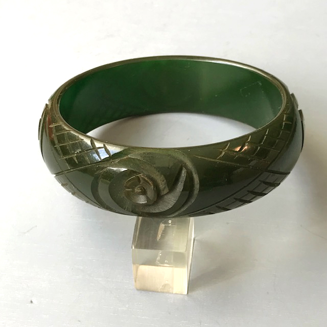 BAKELITE translucent green bangle with slash carved roses and diagonals