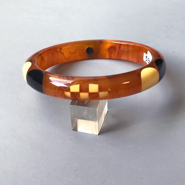 SHULTZ bakelite bangle, translucent marbled caramel with black and cream dots, caramel and cream checked dots